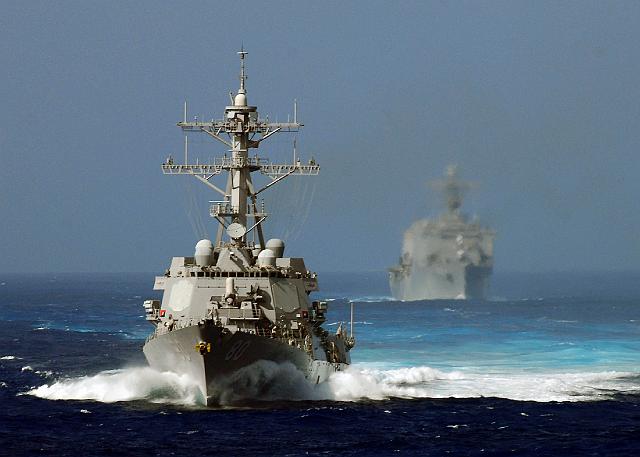 080903-N-4236E-103.JPG - 080903-N-4236E-103 ATLANTIC OCEAN (Sept. 03, 2008) - The guided-missile destroyer USS Roosevelt (DDG 80) maneuvers in front of the amphibious transport dock ship USS Carter Hall (LSD 50). Roosevelt and Carter Hall are deployed as part of the Iwo Jima Expeditionary Strike Group (ESG) in the Navy's 5th and 6th Fleet areas of responsibility supporting maritime security operations. The Iwo Jima ESG is made up of Roosevelt; Carter Hall; the multi-purpose amphibious assault ship USS Iwo Jima (LHD 7); the amphibious dock landing ship USS San Antonio (LPD 17); the guided-missile cruiser USS Vella Gulf (CG 72); the guided-missile destroyer USS Ramage (DDG 61); all homeported at Norfolk, Va.; the guided-missile destroyer USS Roosevelt (DDG 80), homeported at Mayport, Fla.; and the fast attack submarine USS Hartford (SSN 768), homeported at Groton, Conn. U.S. Navy photo by Mass Communication Specialist Seaman Chad R. Erdmann (Released)